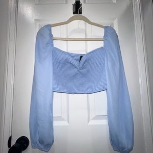 Windsor crop top with long sleeves.